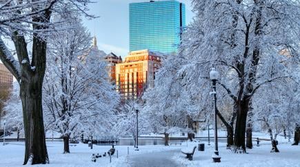 The Newbury Boston from The Public Garden covered in snow